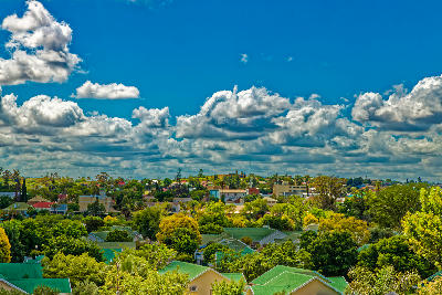 View across the leafy suburbs and townscape of Oudtshoorn in the Little Karoo, Western Cape, South Africa