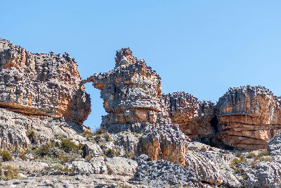 Secondary sandstone arch near Wolfberg Cracks viewed from the hiking trail above Sanddrif in the Cederberg Wilderness.
