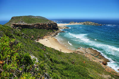 Coastal cliffs, beaches and ocean views along Robberg Peninsula in Plettenberg Bay, South Africa.