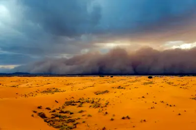 Sandstorm moving across the Erg Chebbi dunes near Merzouga in the Moroccan Sahara.