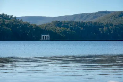 Pumphouse Point and its long pier across Lake St Clair in Tasmania.