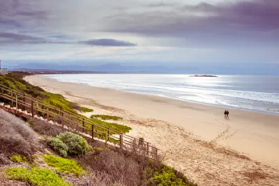 Boardwalk overlooking the wide sandy shoreline of Diaz Beach near Mossel Bay on the Garden Route, South Africa.