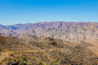 Layered mountain ridges and rocky desert slopes in the Richtersberg region of the Richtersveld, Northern Cape.