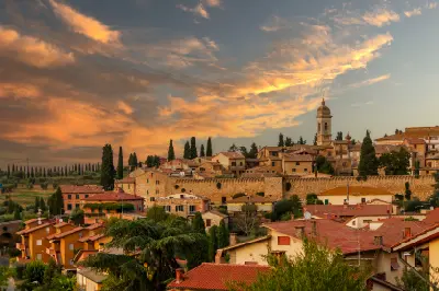 the village of San Quirico d'Orcia in Tuscany at sunset