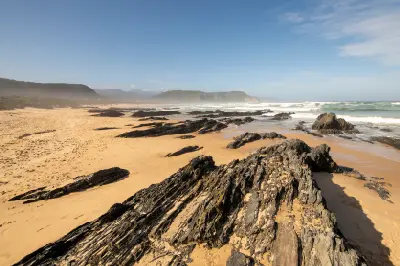Rocky beach and coastal shoreline near Salt River Mouth in Nature's Valley on South Africa's Garden Route.
