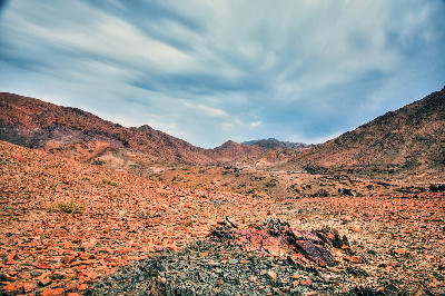 Rock-strewn desert landscape and mountain valleys in Richtersveld National Park, Northern Cape, South Africa.