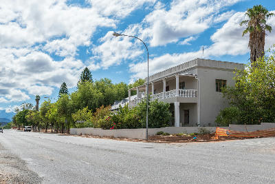 Leafy residential street and Karoo town architecture in Oudtshoorn in the Western Cape, South Africa
