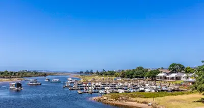 Boats and marina facilities on the Keurbooms River estuary near the river mouth at Plettenberg Bay.