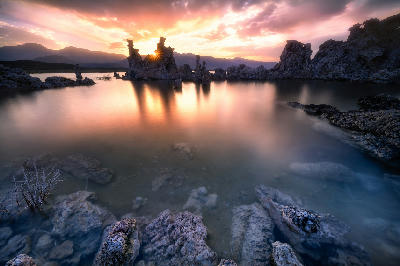 south tufa area mono lake tufa formations sunset sunstar reflection eastern sierra nevada california