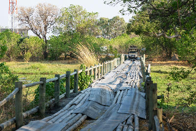 Wooden bridge crossing the Khwai River near Khwai Village on the edge of Moremi Game Reserve in Botswana.