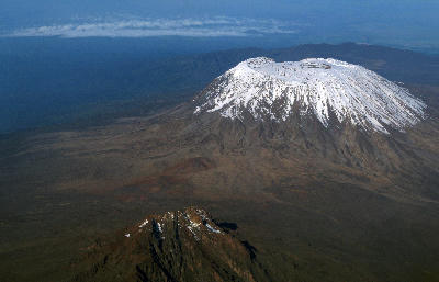 Aerial view of Kibo summit crater and snowfields on Mount Kilimanjaro, Tanzania.