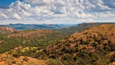 Panoramic view of ridges, valleys and bushveld landscapes within the Vredefort Dome World Heritage Site in South Africa.