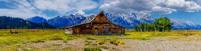 Historic Moulton Barn on Mormon Row with the Teton Range in the background, Grand Teton National Park, Wyoming, USA.