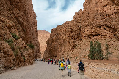 Towering canyon walls and river corridor inside Todra Gorge in Morocco