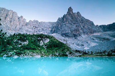Turquoise Lago di Sorapis glacial lake in the Dolomites near Cortina d'Ampezzo, Italy.