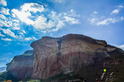 Mushroom Rock sandstone formation beneath dramatic clouds in Golden Gate Highlands National Park, Free State, South Africa.