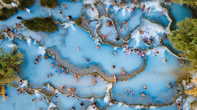Thermal waterfalls and hot spring pools at Cascate del Mulino in southern Tuscany, Italy.