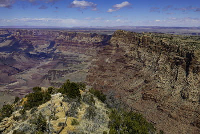 View from Navajo Point on the Grand Canyon South Rim showing layered canyon walls and the Colorado River below