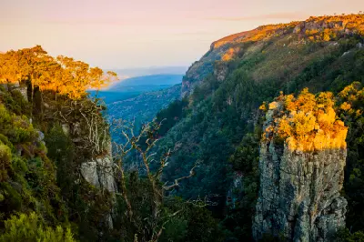 Pinnacle Rock quartzite spire rising from a deep forested gorge along the Panorama Route near Graskop, Mpumalanga, South Africa.