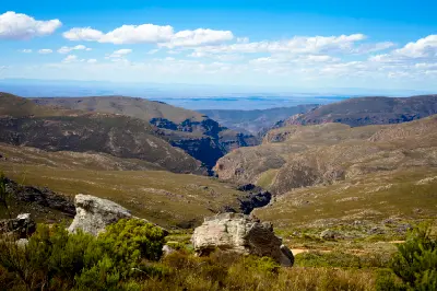 Expansive mountain and canyon landscape in the Swartberg Mountains of the Klein Karoo in South Africa.