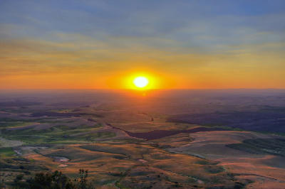 Sunset over rolling Palouse farmland viewed from Steptoe Butte in Washington State