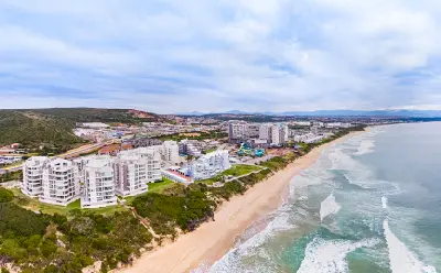 Aerial view of Diaz Beach and beachfront apartments along the coastline west of Mossel Bay on the Garden Route, South Africa.