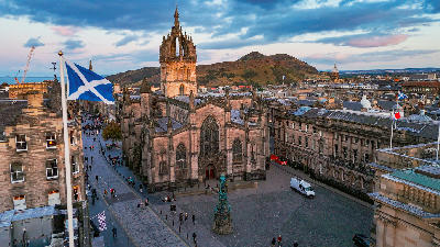 Aerial view of St Giles’ Cathedral in Edinburgh’s Old Town, showing the historic city centre and surrounding medieval streets.