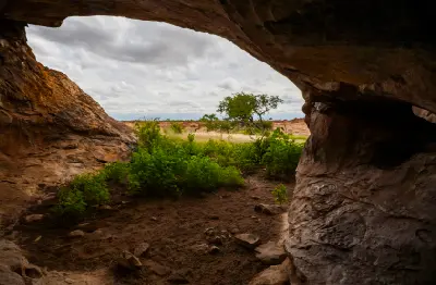 View from inside Little Muck Shelter, an Iron Age archaeological site with rock engravings in the Mapungubwe Cultural Landscape, Limpopo Valley, South Africa.