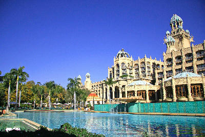 Main swimming pool and ornate Palace of the Lost City hotel at Sun City Resort, North West Province, South Africa.