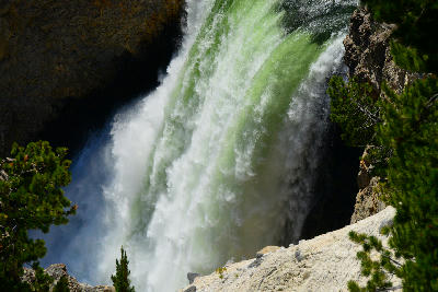 Close-up view from the brink of the Lower Falls as water plunges into the Yellowstone canyon