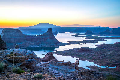 View from Alstrom Point overlooking Lake Powell with mesas and winding waterways in the Southwest United States.