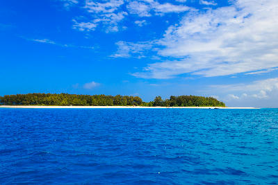 View of Mnemba Island surrounded by the Indian Ocean off the northeast coast of Zanzibar, Tanzania.