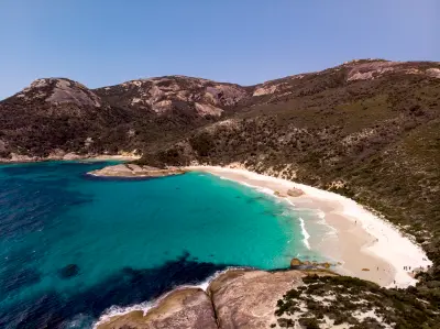 Aerial view of Little Beach with turquoise water, white sand and granite hills in Two Peoples Bay Nature Reserve near Albany, Western Australia.