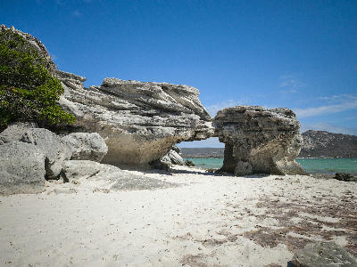 Preekstoel rock formation at Kraalbaai, a natural coastal arch beside the turquoise waters of Langebaan Lagoon in West Coast National Park, South Africa.