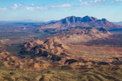Sweeping view across rugged ridges and mountain peaks of the West MacDonnell Ranges.