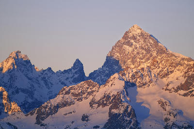 Barre des Écrins peak and glacier at sunrise in the French Alps