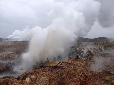 Thick steam plume from a geothermal vent at Gunnuhver on the Reykjanes Peninsula, Iceland.