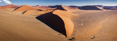 Panoramic aerial view of Dune 45 and surrounding red sand dunes in the Sossusvlei region of Namibia’s Namib Desert.