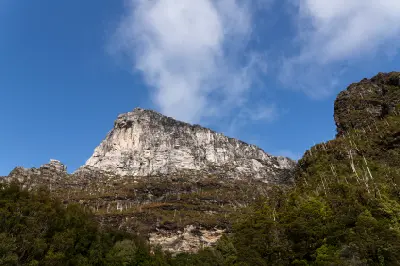 Close view of the rocky summit and cliffs of Frenchmans Cap in western Tasmania.