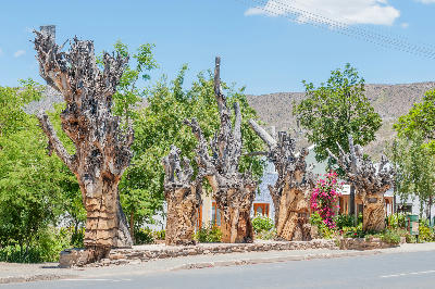 The Burghers of Prince Albert wooden sculpture installation in the Karoo town of Prince Albert in South Africa.