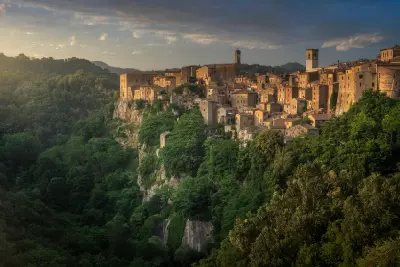 Ancient village of Sorano built on volcanic tuff cliffs at sunset in the Province of Grosseto, southern Tuscany, Italy.