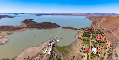 Aerial view of Gariep Dam, marina and resort facilities on the shoreline of South Africa's largest dam.