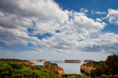 Limestone sea stacks viewed from the coastal cliffs at Bay of Islands, Victoria, Australia.