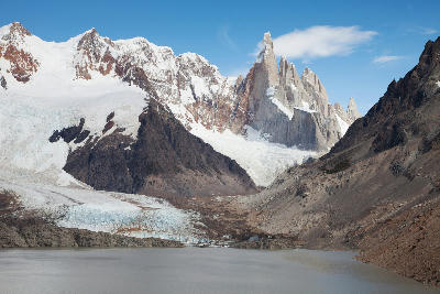 Laguna Torre with glacier, rocky moraine, and Cerro Torre peaks in Los Glaciares National Park, Patagonia, Argentina.