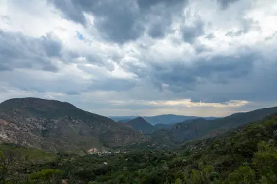 Remote mountain valleys and dramatic storm clouds in the Baviaanskloof Wilderness Area, Eastern Cape, South Africa.