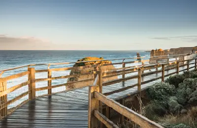 Timber viewing boardwalk overlooking the Twelve Apostles and Southern Ocean in Victoria, Australia.