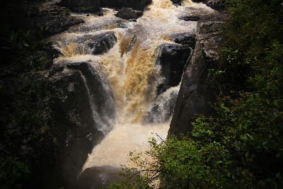 Andriamamovoka Falls cascading through rainforest gorge terrain near Ranomafana National Park in eastern Madagascar