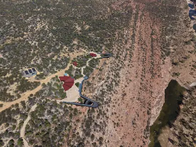 Aerial view showing the twin Kalbarri Skywalk platforms extending from the cliff above the Murchison River gorge.