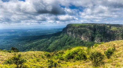 Escarpment cliffs and panoramic Lowveld views from God's Window along the Panorama Route in Mpumalanga, South Africa.