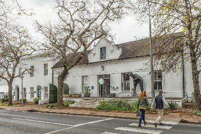 Historic Cape Dutch building and streetscape along Dorp Street in Stellenbosch town centre, Cape Winelands, Western Cape, South Africa.